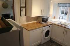 Kitchen - microwave, washer/dryer and fridge freezer